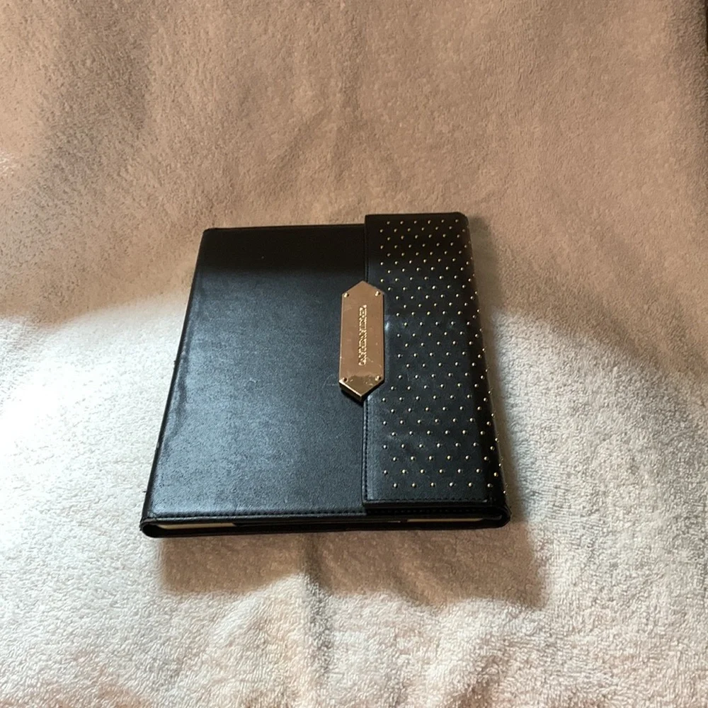 Black Christian Siriano iPad case.